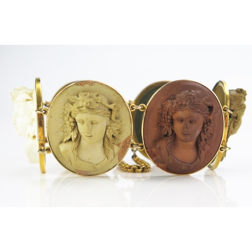 158 - A Large Antique Cameo Lava Bracelet in a precious yellow metal setting, the six 35x30mm high relief ... 