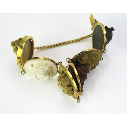 158 - A Large Antique Cameo Lava Bracelet in a precious yellow metal setting, the six 35x30mm high relief ... 