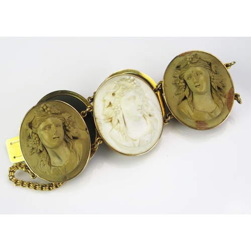 158 - A Large Antique Cameo Lava Bracelet in a precious yellow metal setting, the six 35x30mm high relief ... 