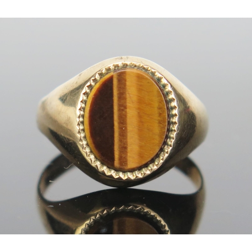 161 - A 9ct Gold and Tiger's Eye Signet Ring, hallmarked, size R.25, 3.55g