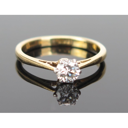 167 - An 18ct Gold and Diamond Solitaire Ring, the c. 4.2mm brilliant round cut stone in an 18CT stamped s... 