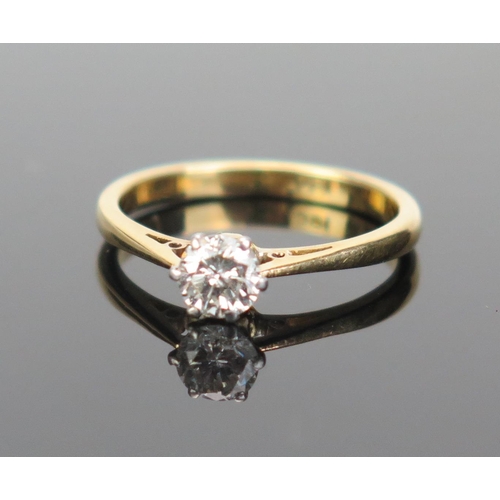 167 - An 18ct Gold and Diamond Solitaire Ring, the c. 4.2mm brilliant round cut stone in an 18CT stamped s... 