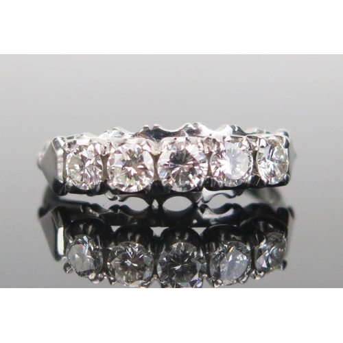 177 - A Platinum and Diamond Five Stone Ring, the brilliant round cuts measuring c. 3.3, 2x 3.3.1 and 2x3m... 