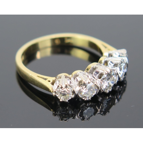 179 - An 18ct Gold and Diamond Five Stone Ring, the brilliant round cuts measuring 5.3, 2x4.1 and 2x3.3mm,... 