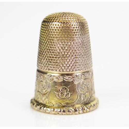 193 - An Antique Precious Yellow Metal Thimble with chased scrolling decoration and in a period Knight & S... 