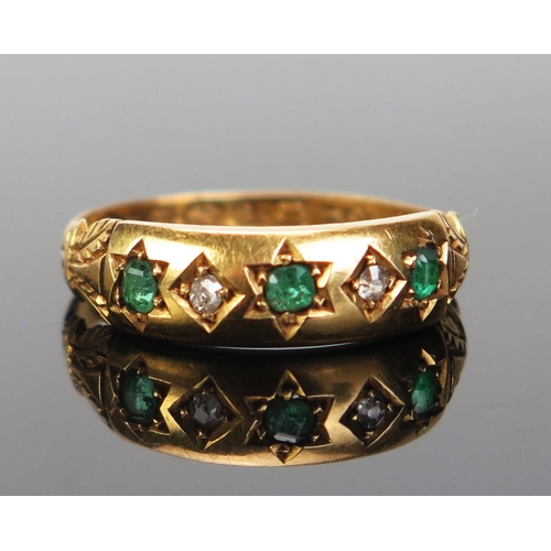 203 - A Victorian Emerald and Diamond Five Stone Ring, c. 2mm central stone flanked by old cushion cuts, B... 