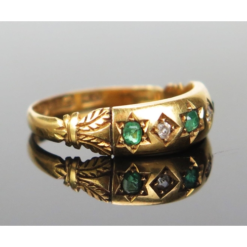 203 - A Victorian Emerald and Diamond Five Stone Ring, c. 2mm central stone flanked by old cushion cuts, B... 