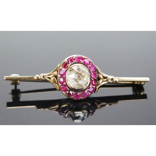 204 - A Georgian Old Cushion Cut Diamond and Ruby Bar Brooch in an unmarked precious yellow metal setting,... 