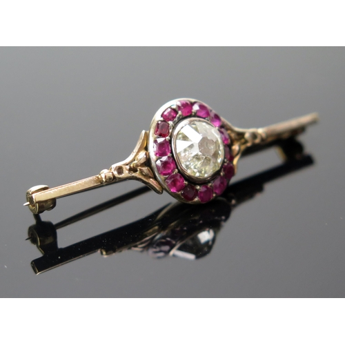 204 - A Georgian Old Cushion Cut Diamond and Ruby Bar Brooch in an unmarked precious yellow metal setting,... 