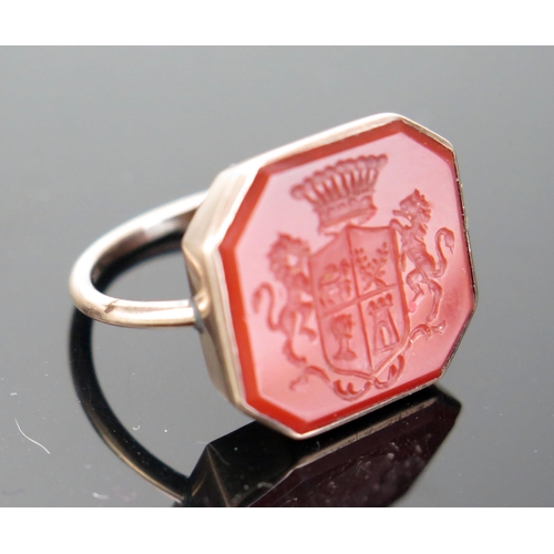 208 - An Antique Carnelian Seal Ring in an unmarked precious yellow metal setting, the 18.5x17mm matrix de... 