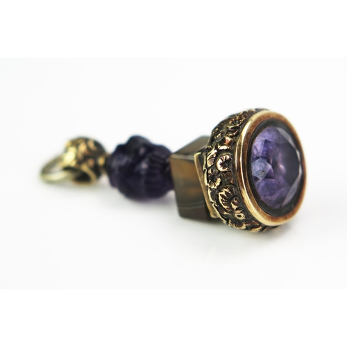 211 - A 19th Century Onyx and Paste Seal in a gilt metal setting. Faults