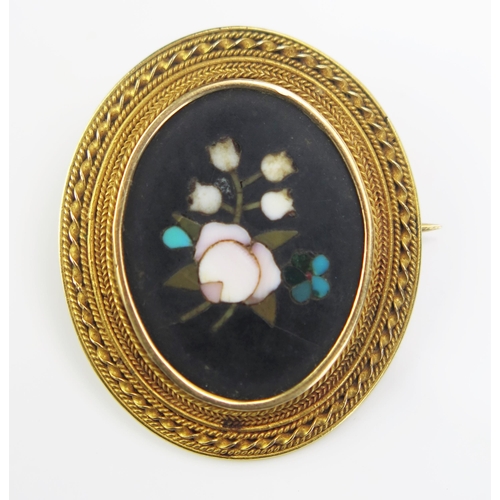 214 - A 19th Century Pietra Dura Floral Decorated Brooch in a precious yellow metal setting, 30x27mm, KEE ... 