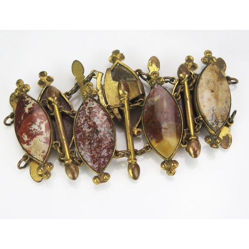 223 - A Victorian Agate Costume Bracelet in a gilt metal setting 35mm wide, 17