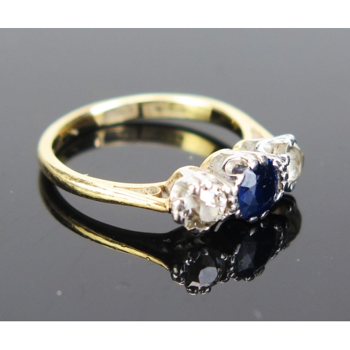 227 - An 18ct Gold and Platinum, Sapphire and Diamond Three Stone Ring, stamped marks, size H.5, 2.69g. So... 