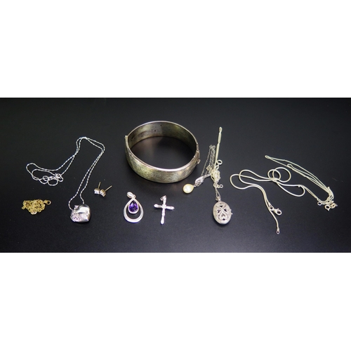 238 - A Selection of Silver Jewellery including lockets, pendants and a silver bangle (bangle A/F), 65.96g... 