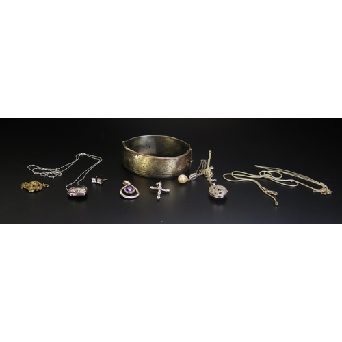 238 - A Selection of Silver Jewellery including lockets, pendants and a silver bangle (bangle A/F), 65.96g... 