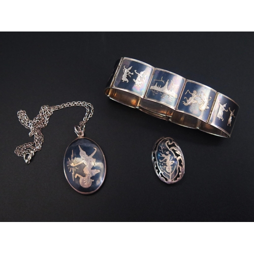 242 - A Siam Silver and Niello Engraved Panel Bracelet, pendant and brooch, 53.2g