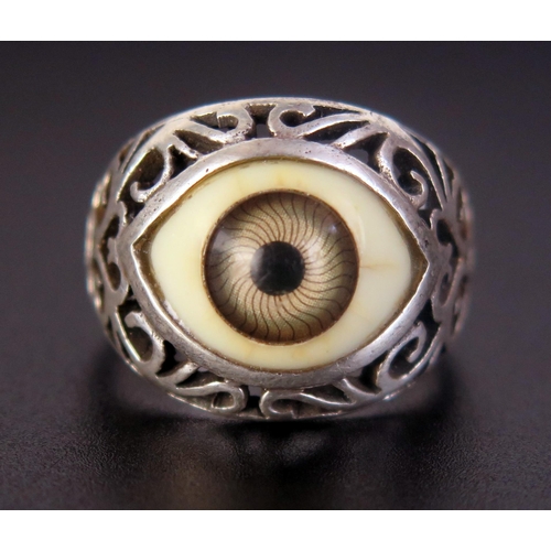 243 - A Sterling Silver Eye Ring,  size S.5