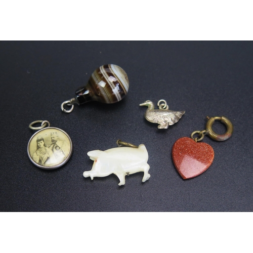 264 - Five Antique Charms and Fobs including banded agate and a goldstone heart