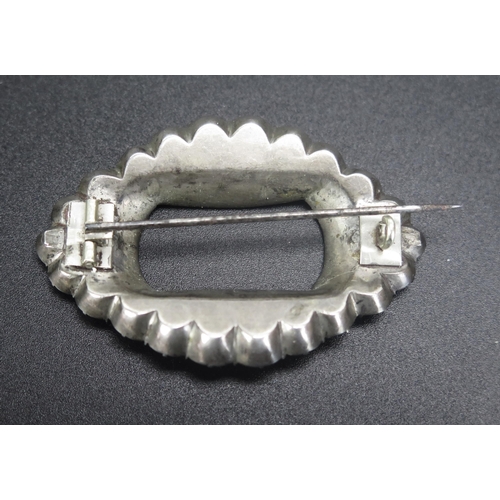 267 - An Antique Foil Backed Paste Brooch in an unmarked precious white and yellow metal setting, 54x36cm
