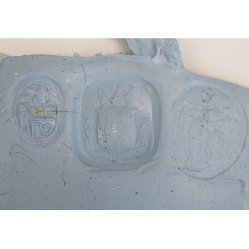 270 - An Antique Carnelian Seal Matrix decorated with a Coat of Arms and Latin Motto 