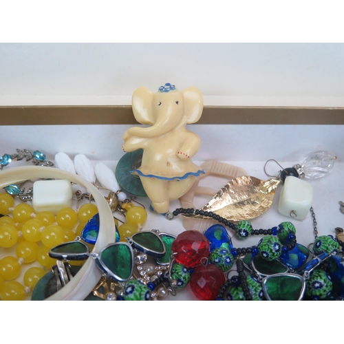 291 - A 1970s Plastic Ballerina Elephant Ballerina Dancer (64mm tall) and other costume jewellery includin... 
