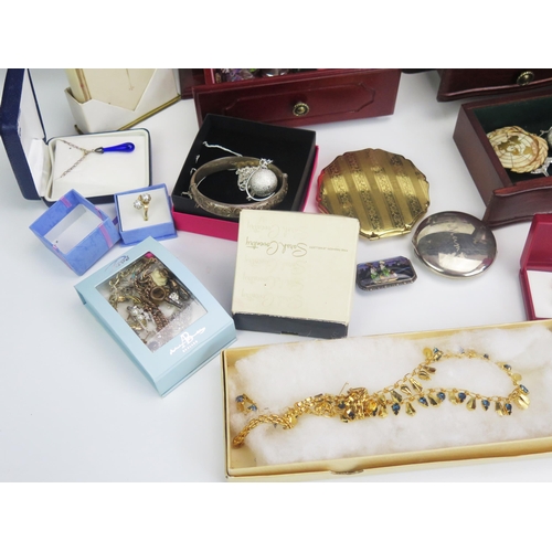295 - A Large Selection of Costume Jewellery including silver hinged bangle, silver cufflinks, etc.