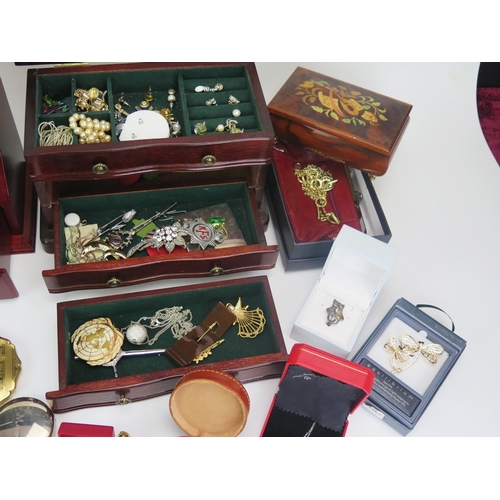 295 - A Large Selection of Costume Jewellery including silver hinged bangle, silver cufflinks, etc.