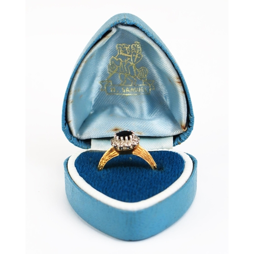 412 - An 18ct Gold, Sapphire and Diamond Cluster Ring, c. 5.4mm central stone, 9.5mm head, size N, hallmar... 