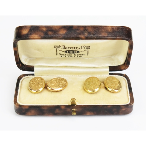 414 - An Antique Pair of 15ct Gold Oval Cufflinks with chased scrolling foliate decoration, Birmingham 190... 