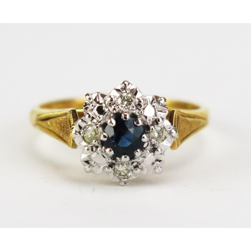 417 - An 8ct Gold, Sapphire and Diamond Cluster Ring, c. 11mm head, hallmarked, size M.5, 3.79g