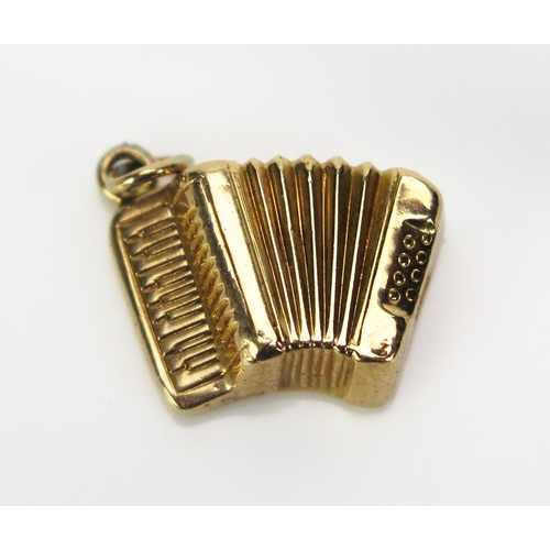 42 - A 9ct Gold Accordion Charm, hallmarked, .81g