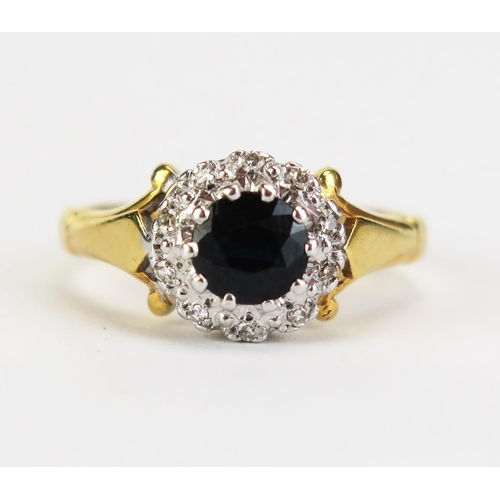 424 - An 18ct Gold, Sapphire and Diamond Cluster Ring, 9mm head, stamped 18CT, size L, 4g