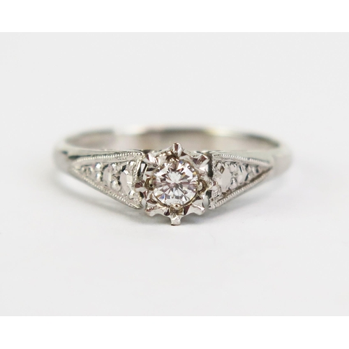 427 - An 18ct White Gold and Diamond Solitaire Ring, c. 3.8mm illusion set stone, hallmarked, size N, 3.32... 
