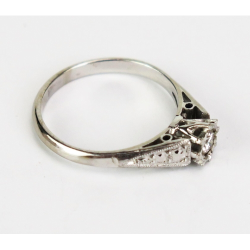 427 - An 18ct White Gold and Diamond Solitaire Ring, c. 3.8mm illusion set stone, hallmarked, size N, 3.32... 