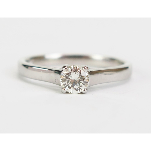 428 - A Platinum and Diamond Solitaire Ring, stamped 950, size L.5, 3.96g, 4.1mm diameter stone