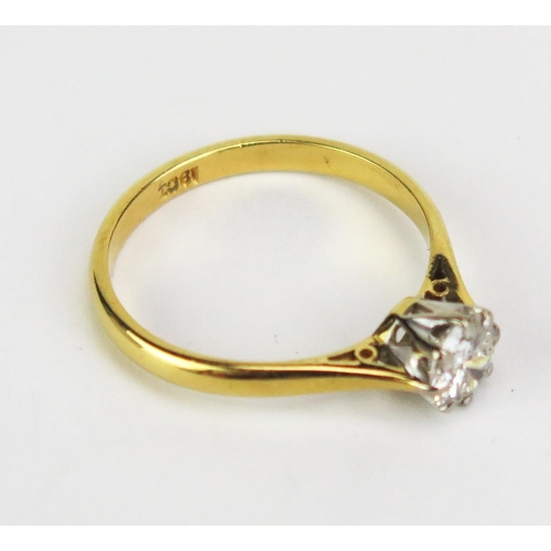429 - An 18ct Gold and Diamond Solitaire Ring, stamped 18CT, c. 5.2mm stone, size L.75, 2.17g