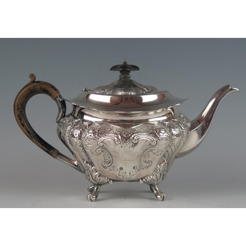 504 - A late Victorian silver teapot, maker Albert Henry Thompson, Sheffield, 1894, crested, of lobed oval... 