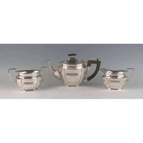 505 - A George V silver matched three-piece silver tea service, maker William Aitken, Birmingham, 1910/20,... 