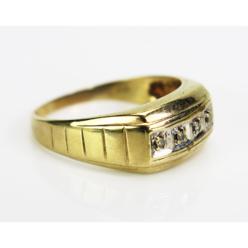 69 - A Gent's 9ct Gold and Diamond  Four Stone Ring, c. 1.4mm stones, continental marks, size W.5, 4.88g