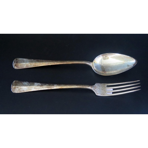 698 - A German silver table fork and matching spoon, stamped marks, 133gms, 4.28ozs