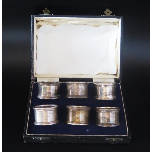 700 - A set of six George V silver napkin rings, maker Robert Pringle & Sons, London, 1929, initialled, of... 