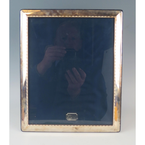 707 - An Elizabeth II silver photograph frame, maker Carr's of Sheffield, Sheffield, 1995, 29.5 x 24.5cm