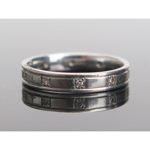 71 - A Platinum and Diamond Eternity Ring, stamped 950, 3mm wide, size I, 2.99g