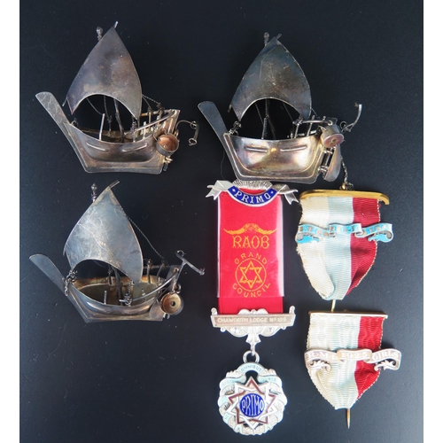 710 - Three silver models of single mast sailing ships each 7cm long, together with a RAOB silver and enam... 