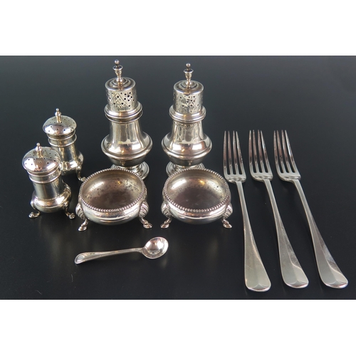 712 - A mixed collection of silverwares, various makers and dates, includes three dessert forks, four asso... 