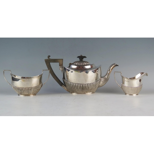 728 - An Edward VII Silver Bachelor's Three Part Tea Set, Birmingham 1912, 	Cooper Brothers & Sons Ltd., 3... 