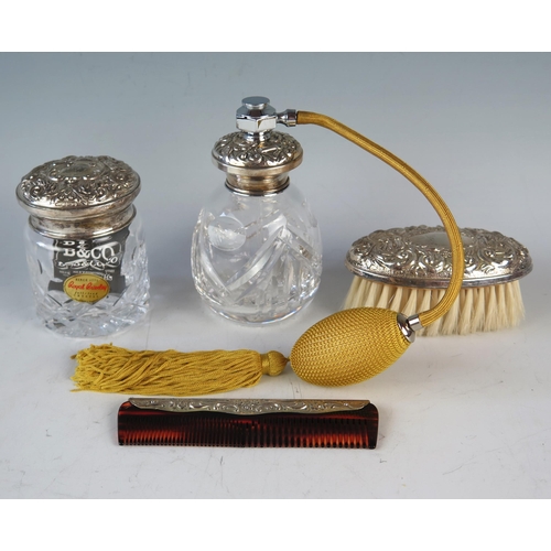 729 - A QEII Silver Mounted Cut Crystal Atomiser, dressing table toiletry pot, brush and comb