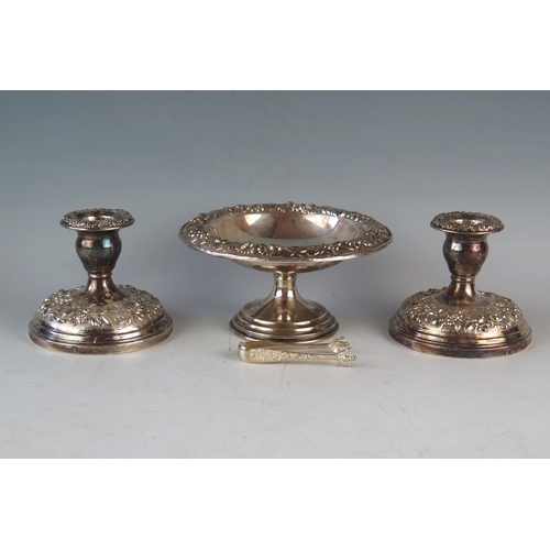 730 - A Sterling Silver Comport (16cm diam. x 8.5cm high), pair of matching loaded candlesticks and sugar ... 