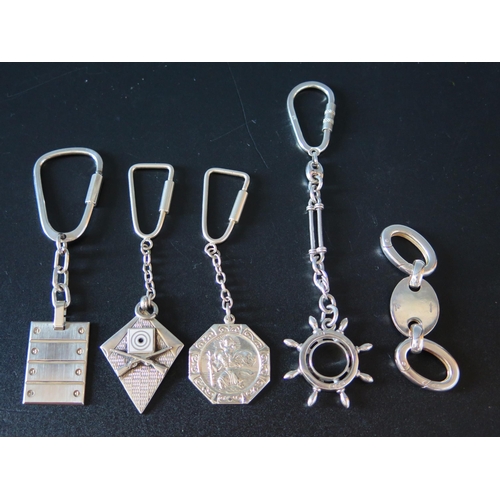 749 - Five Silver Keyrings, some hallmarked, 72.4g gross